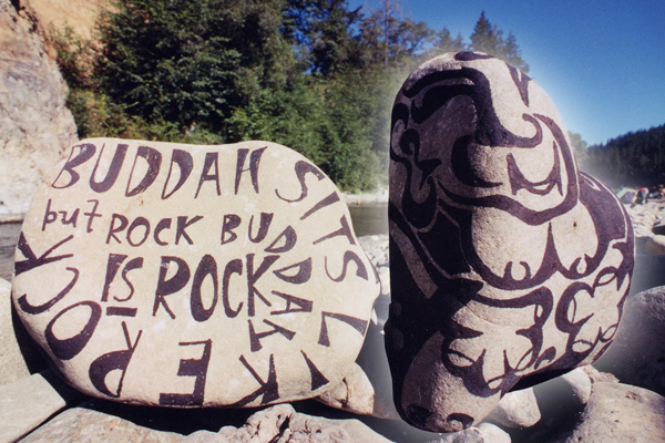 Buddah Sits Like Rock but Rock Buddah IS Rock Reggae on the River 2002 Sharpie Sculpture of rock depicting Enlightened One by Matthew Flansburg with LIT FUZE Choir member Remay White fLANSBURG dESIGN